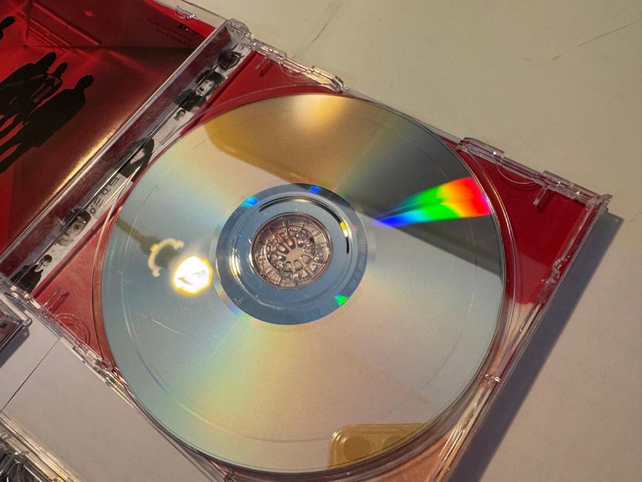 Discman + 3 cd.