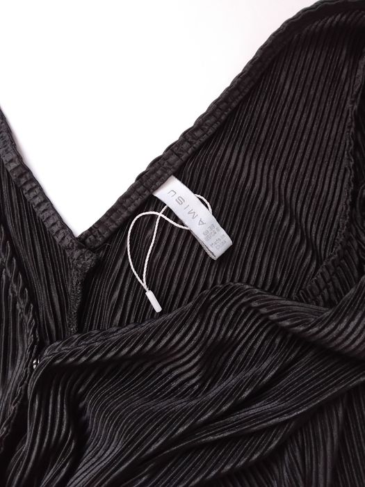 Długi czarny kombinezon Amisu