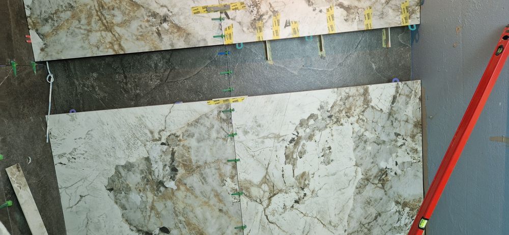 Вкладання керамічної плиткі і інші будівельні  роботи