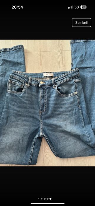 Jeansy dzwony Reserved L