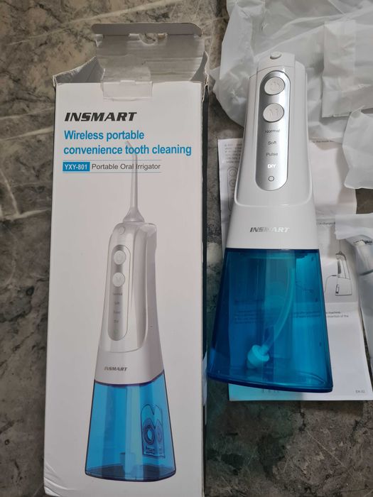 IRYGAToR ma 4 tryby mycia zębów 300ml + 6 różnych dysz końcówek