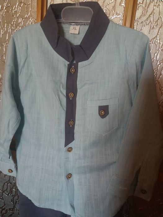 Новий костюмчик на хлопчика