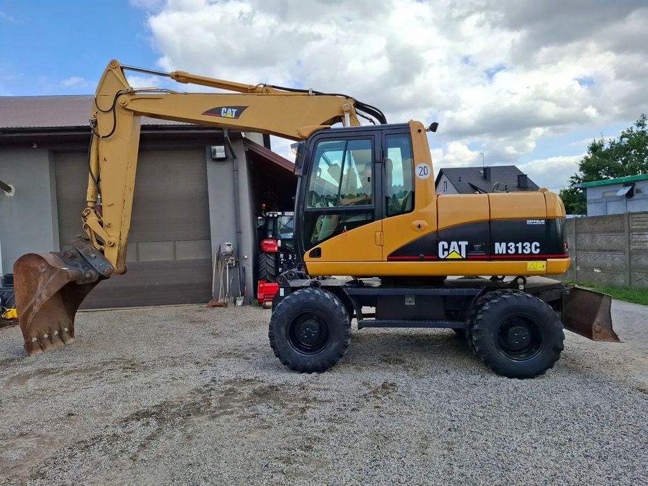 Caterpillar CAT M 313C  koparka kołowa CAT sprowadzona z Niemiec  315