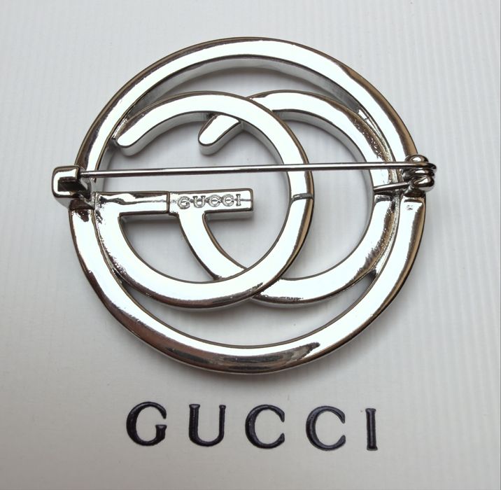 Broszka Gucci srebrna z cyrkoniami