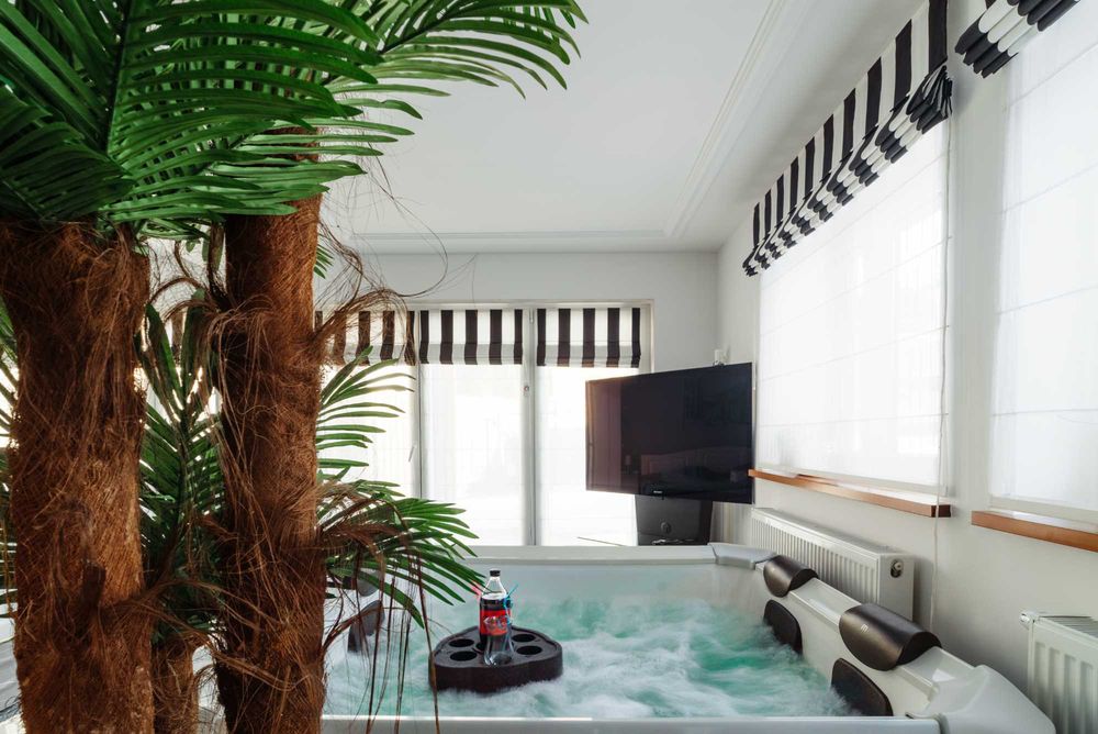 Apartament Domek Nastrojowy LOVE SPA JAUCUZZI w pokoju na wyłączność na życzenie śniadanie do pokoju strefa grill wypoczynek jacuzzi  rowery E-bike