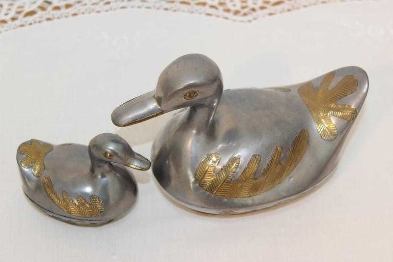 Фігурки качок з олова