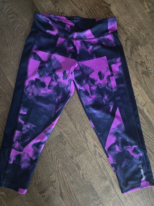 Kolorowe leginsy Reebok S
