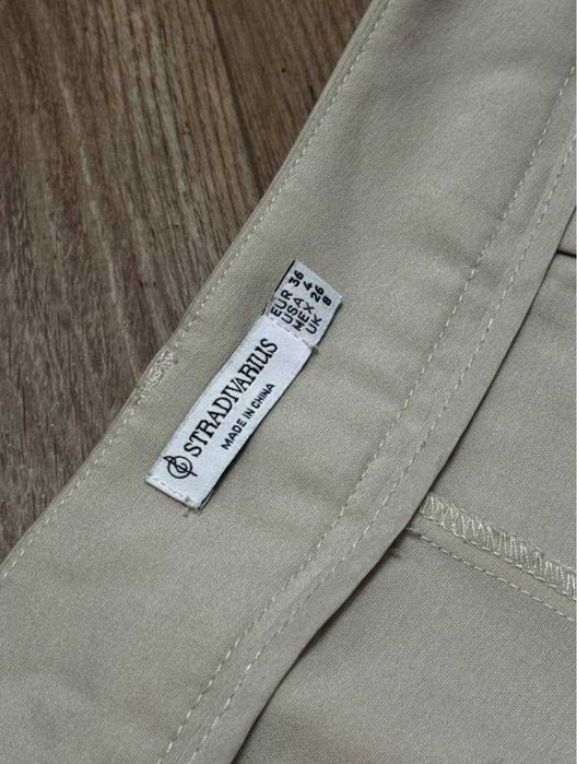 класичні брюки пастельного кольору палаццо прямі кльош