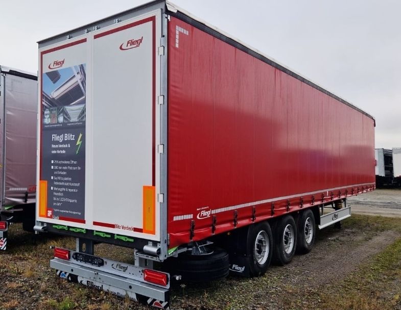 Fliegl Naczepa Kurtynowa Standard  dach podnoszony do załadunku, waga naczepy 5 950 kg