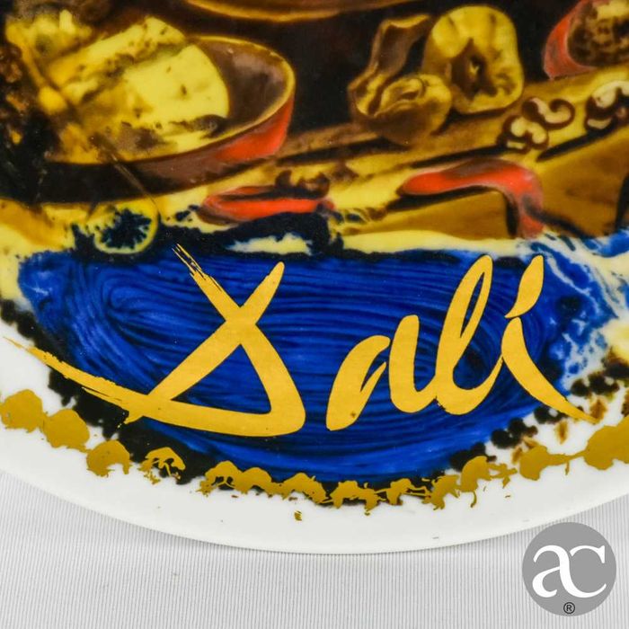 Prato Salvador Dalí em porcelana Rosenthal, pintado a ouro, assinado