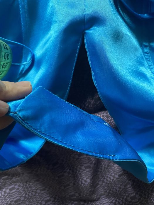 Блакитна бірюзова вечірня сукня з відкритою спинкою
