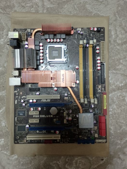 Продам материнку ASUS P5E Deluxe,