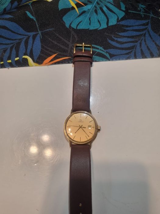 Złoty zegarek Omega