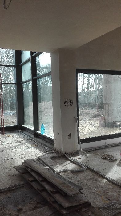 TYNKI maszynowe cementowo-wapienne, gipsowe.