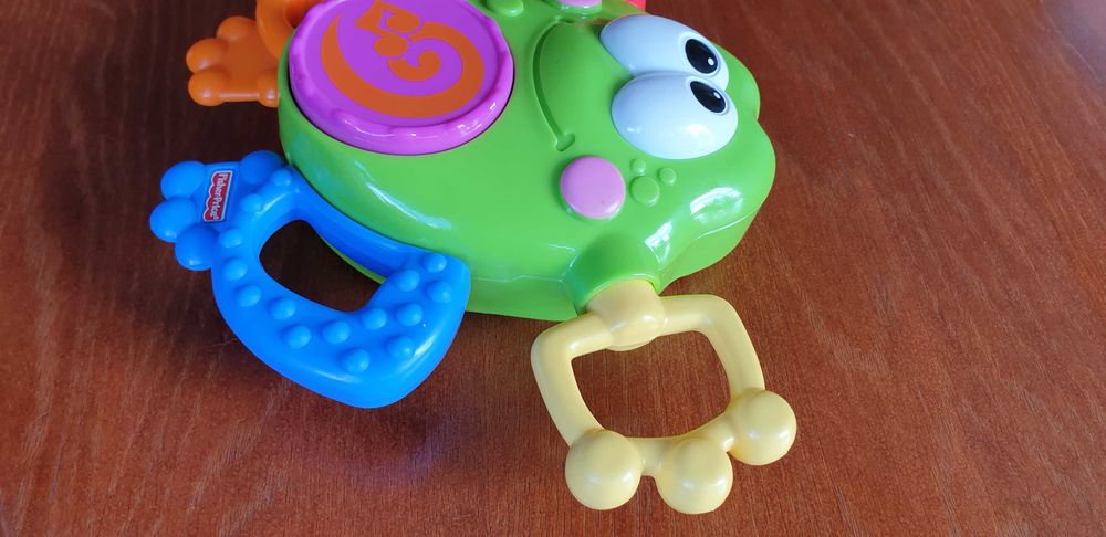 Zabawka muzyczna Fischer price żabka śmieszka