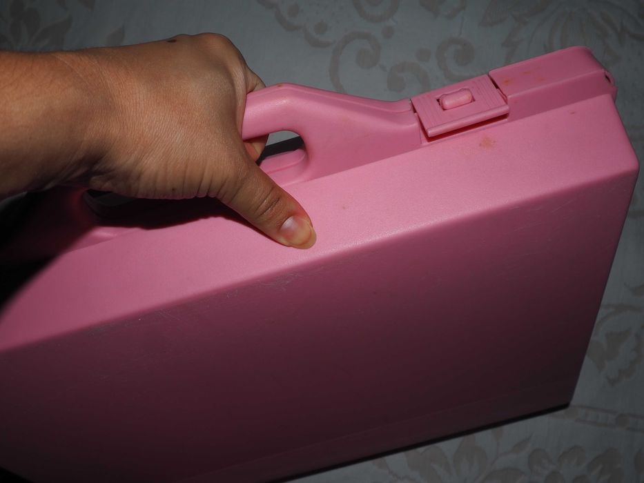 Mala cor-de-rosa para brinquedos e outros