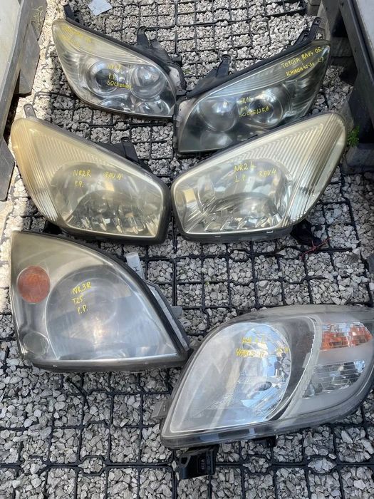REFLEKTORY LEWE PRAWE TOYOTA MIGACZE HALOGENY LAMPA DO TABLICY