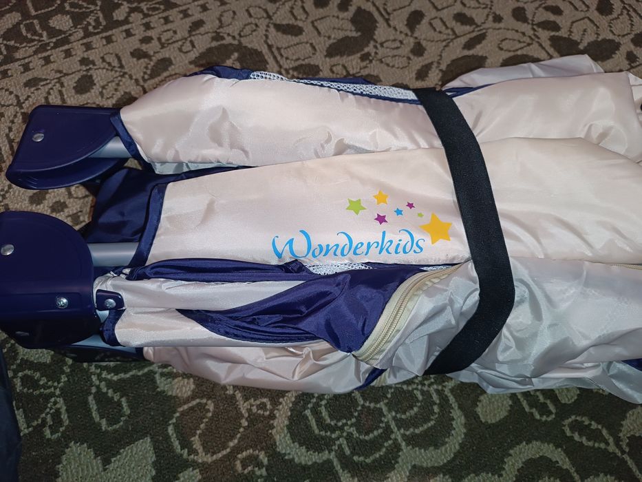 Дитяче ліжечко-манеж Wonderkids. Стан нового.