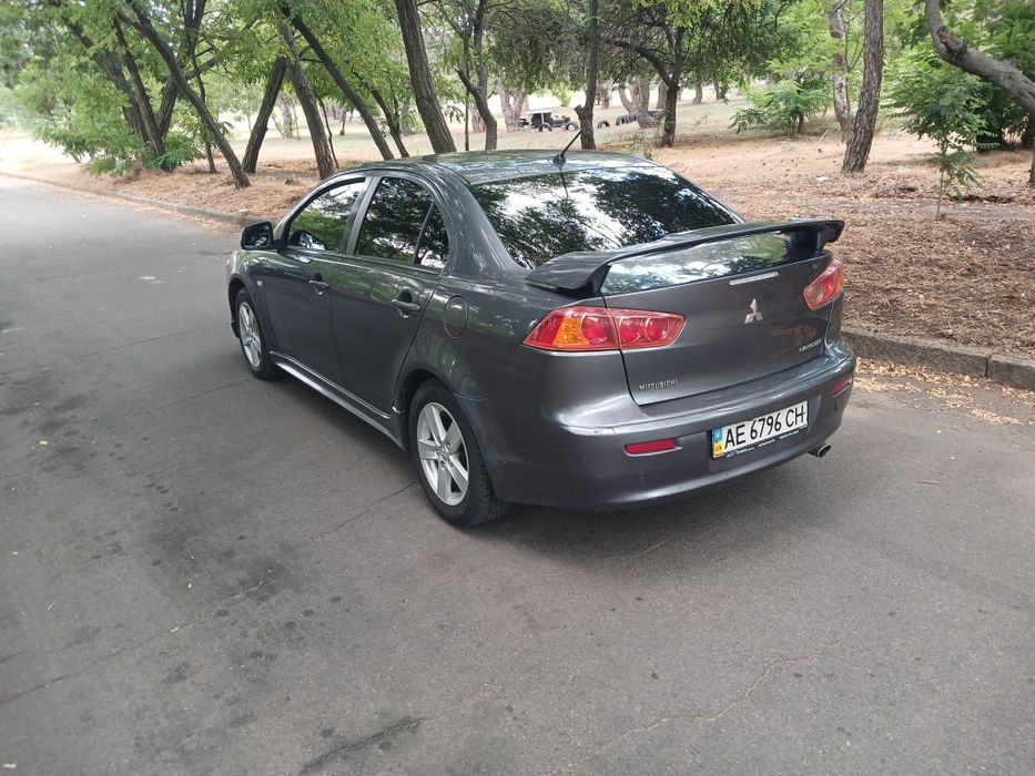 Продам lancer 2.0 акпп газ /бензин