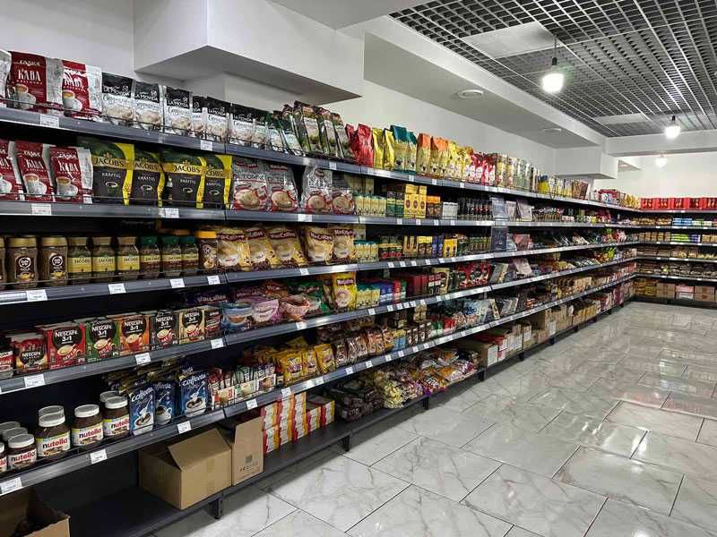 Металеві стелажі для маркетів, каси. Стелажі для одягу, стійки.