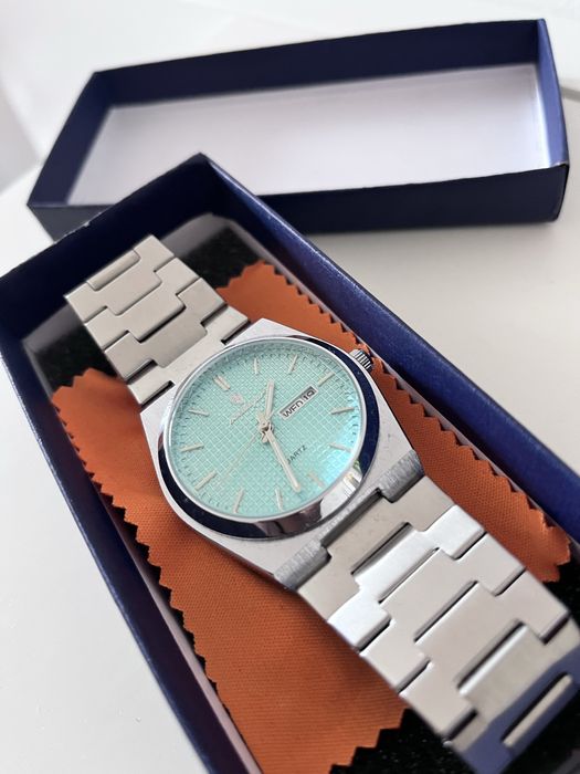 Relógio Pelvini Dante Prateado e Azul Turquesa