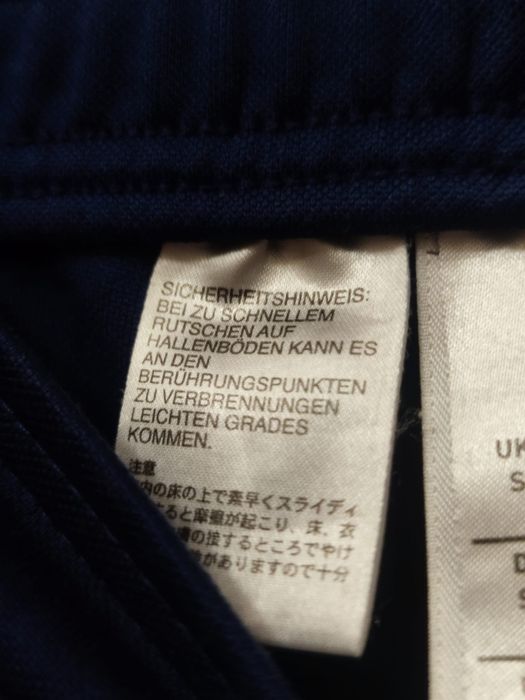 Męskie spodnie S  dresowe marki adidas w kolorze granatowym charaktery