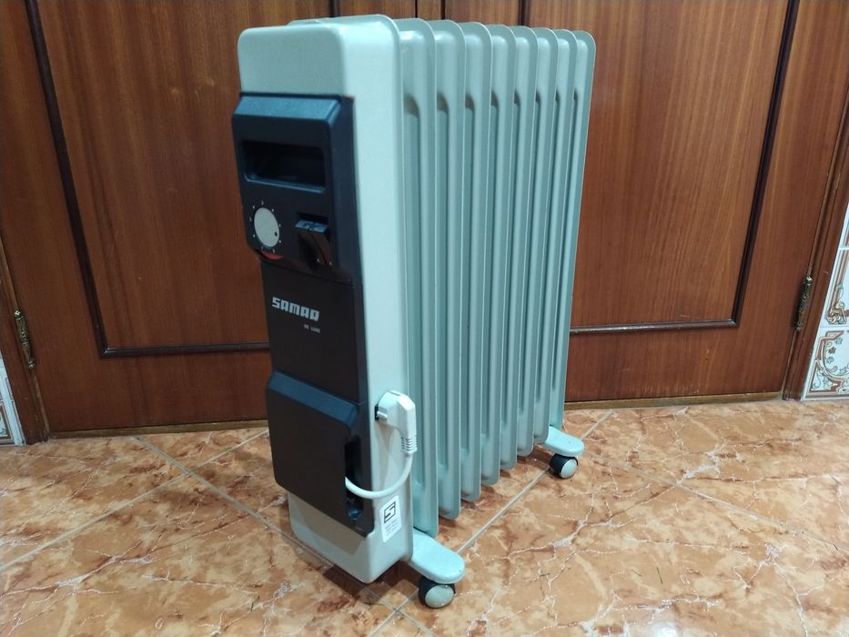 Aquecedor radiador a óleo  casa quarto apartamento vivenda escritório gabinete cozinha.