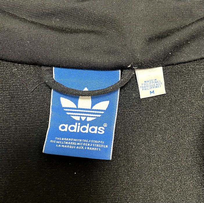 олімпійка adidas originals оригінал М ( чорна з золотом)