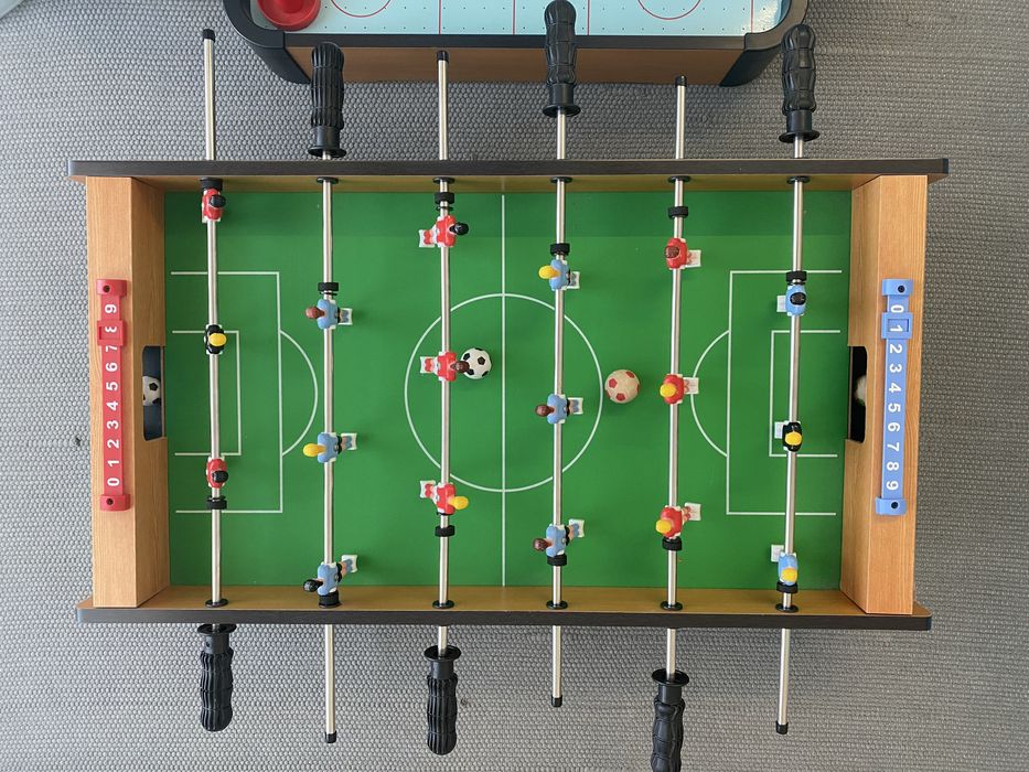 Jogo matraquilhos e Air Hockey para criança