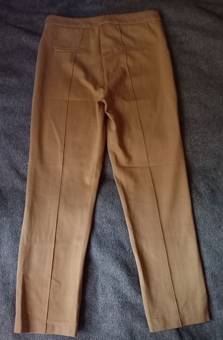 Брюки от бренда Mango