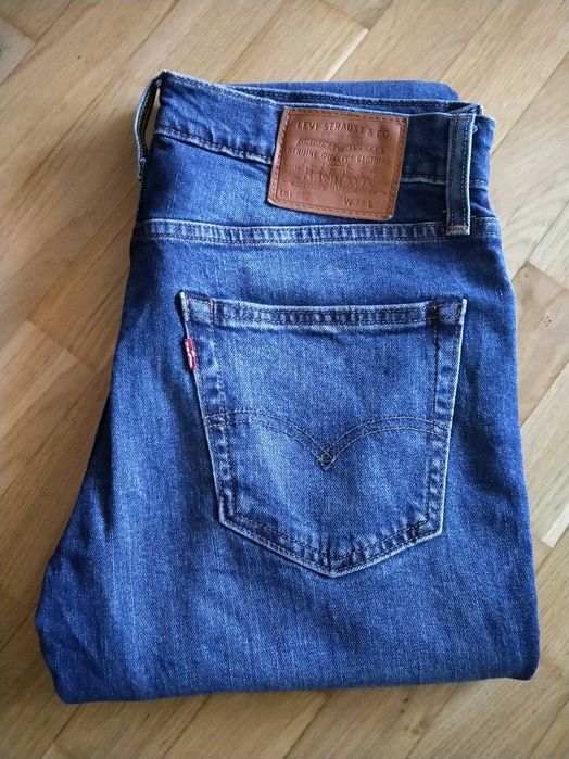 Jeansy męskie oryginalne firmy Levis, niebieskie, Stan BDB