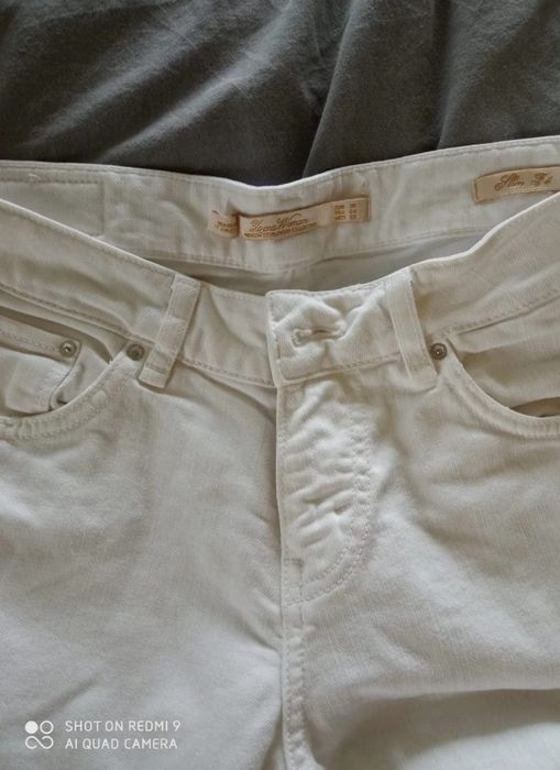 Białe jeansy Zara 36