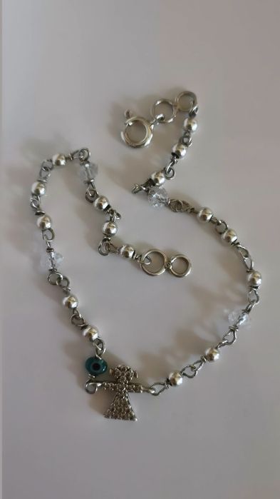 Pulseira em prata menina e olho gordo