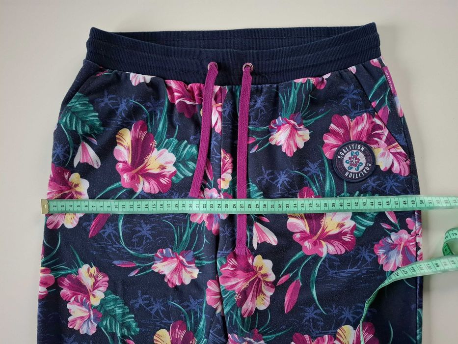 Spodnie dresowe w kwiaty L Coalition