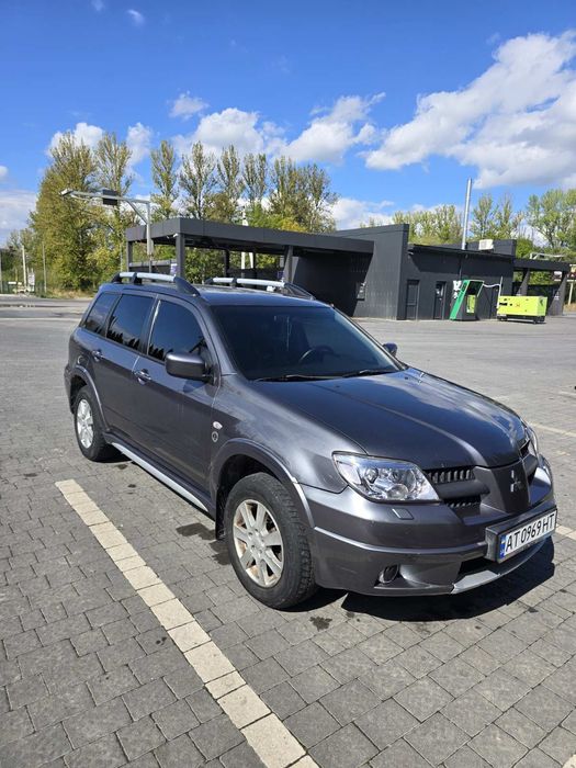 Оутлендер  2,4 газ бензин