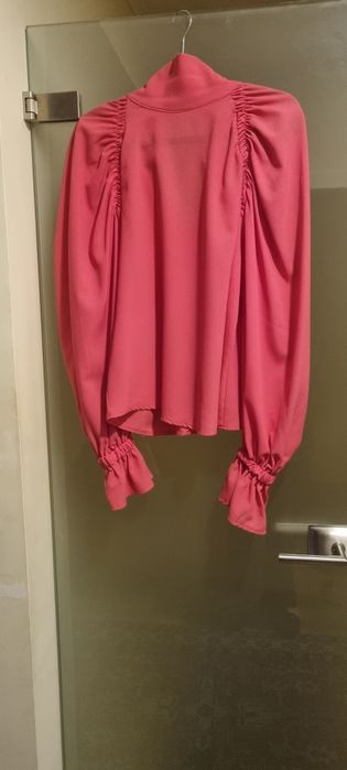 Blusa rosa que veste até L