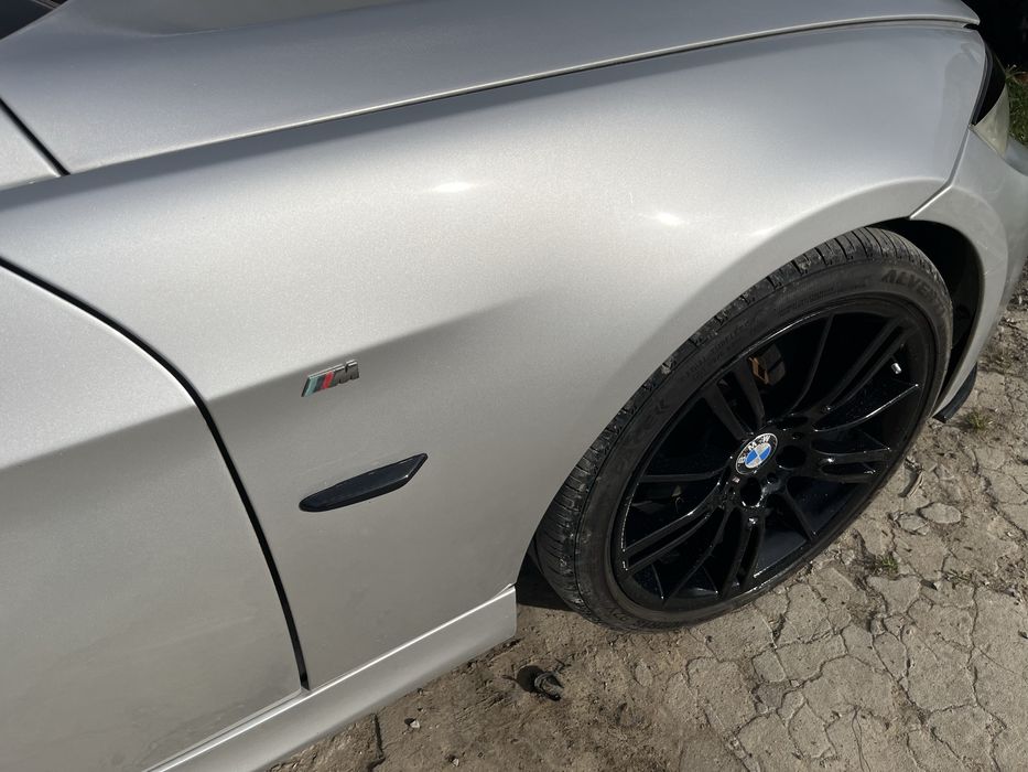 Blotnik przod lewy prawy bmw e90 e91 titansilber