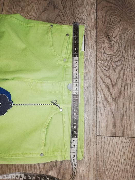 W25 L32 limonkowe nowe spodnie damskie jeansy rurki Wrangler
