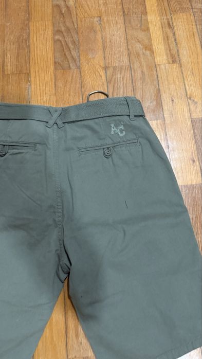 Calções verdes da American College