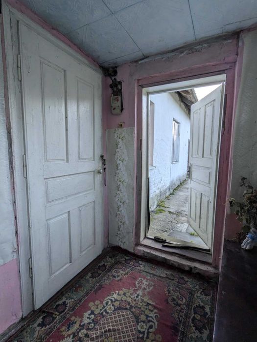 Продається  1 кімнатний  будинок і 14 сотих землі,село Задністрянське.