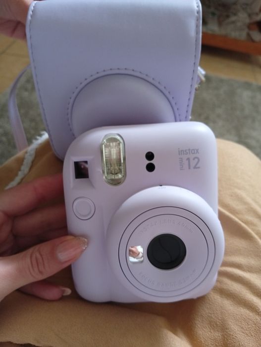 Máquina fotografica instax