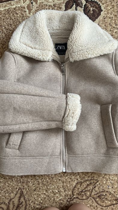 Зимова жіноча дублянка Zara