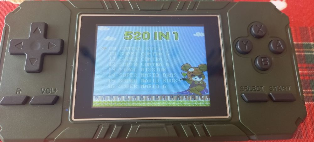 Consola Portátil em caixa com 520 jogos 8 bits