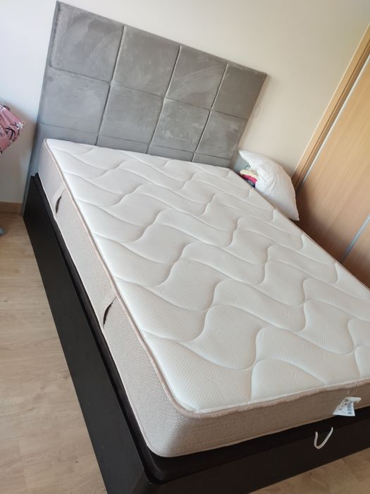 Cama com arrumação