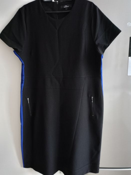 Bardzo ładna ,czarna,firmowa sukienka.