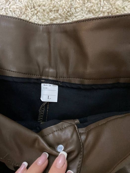 Шкіряні та твідові шорти