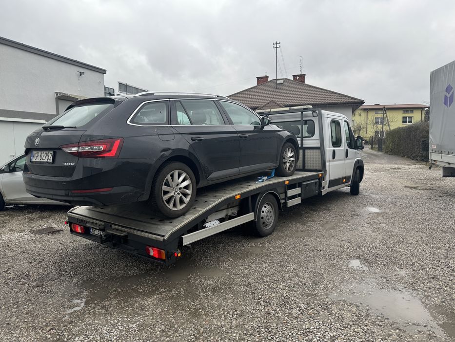 Uslugi transportu lawetą,doka 5 osobowa ,holowanie, pomoc drogowa 24/h