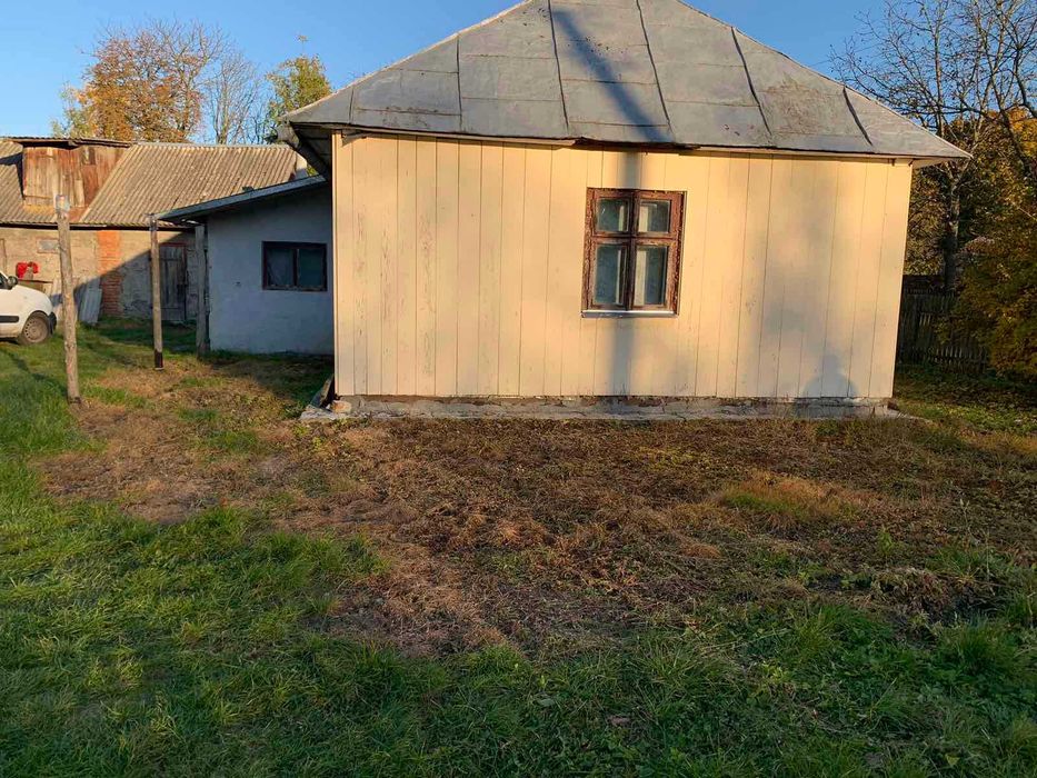 житловий будинок та земельна ділянка 46,5 сот