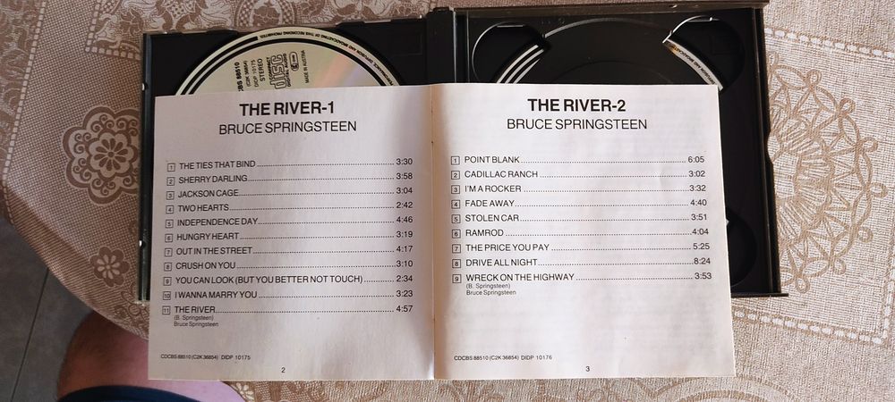 Cds duplos dos Queen e do Bruce Springsteen the river