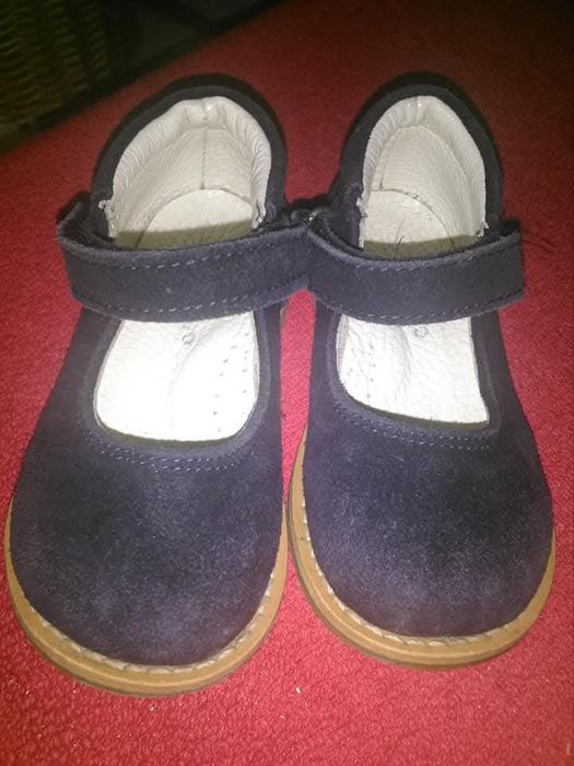 Sapatos de pele azuis